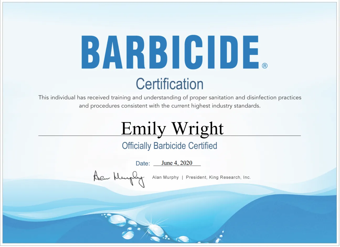 A Barbicide certification awarded to Emily Wright for training in proper sanitation and disinfection practices, signed by Alan Murphy, dated June 4, 2020.