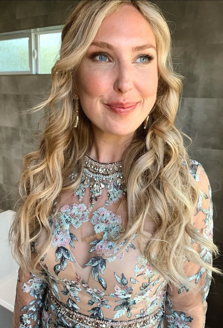 Hollywood Hills wedding, featuring a bride not in white. She chose a romantic and glowing airbrush makeup look, with a waved half up bridal hairstyle.