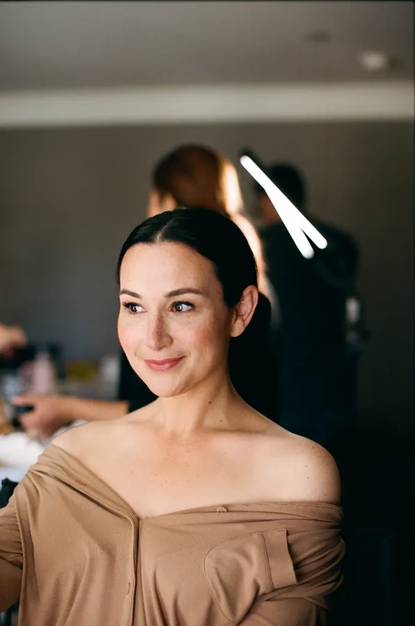 natural looking airbrush makeup and romantic hairstyle for this adorable bride in los angeles