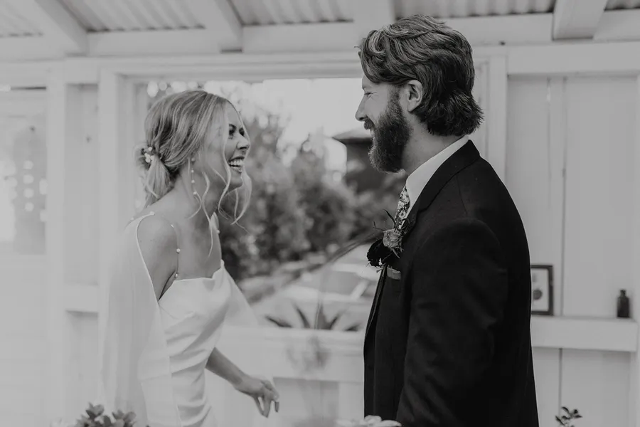 Los Alamos wedding day, bride and groom see each other before the ceremony in intimate first look moment.
