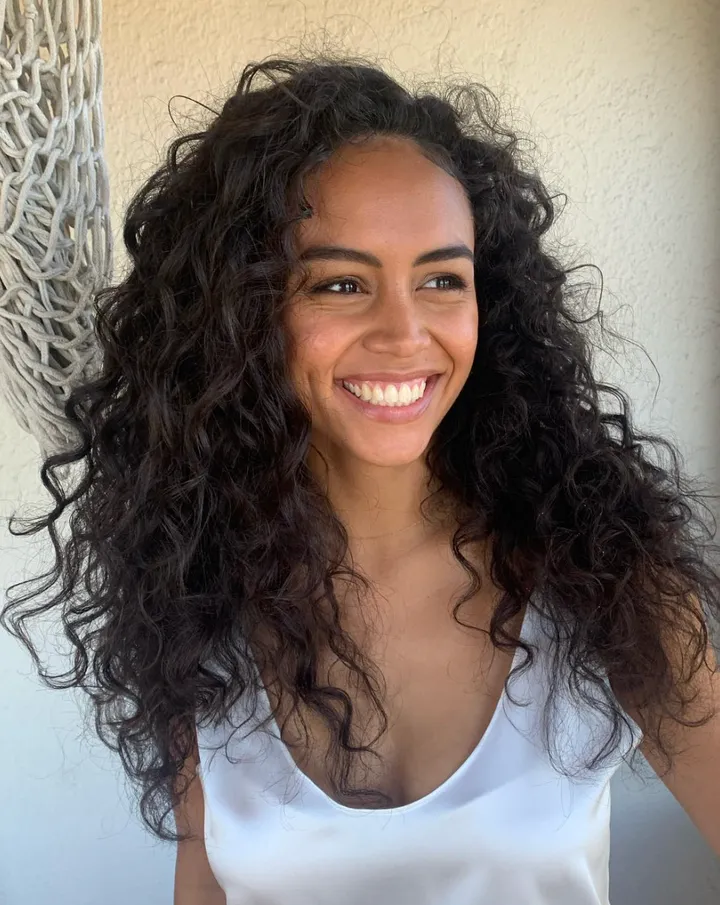 Styling naturally curly hair for brides in Los Angeles, California.