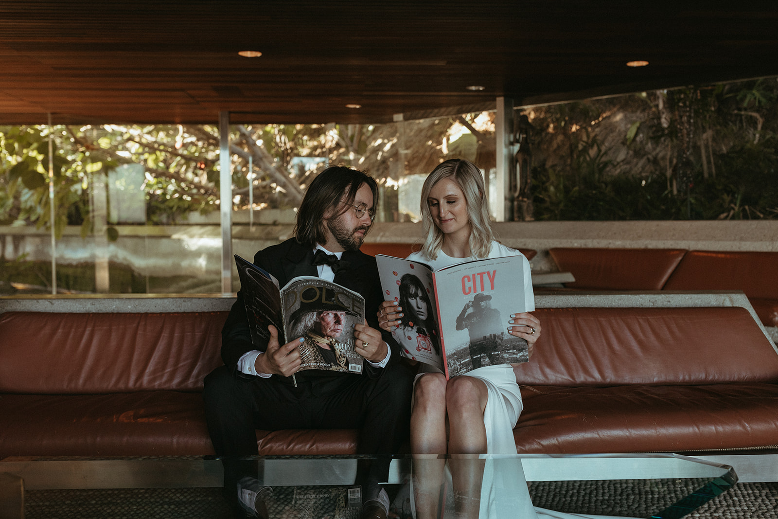 Couple reading magazines at the Sheats-Goldstein residence