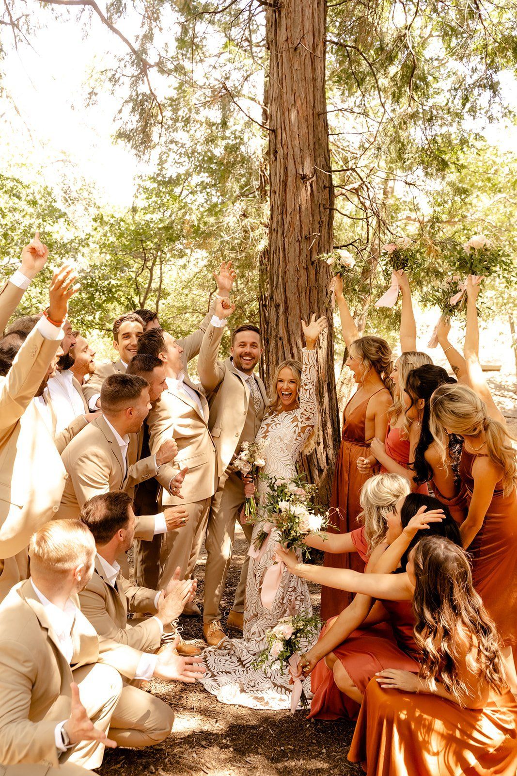the bridal party celebrates this gorgeous bride and groom at lake arrowhead wedding