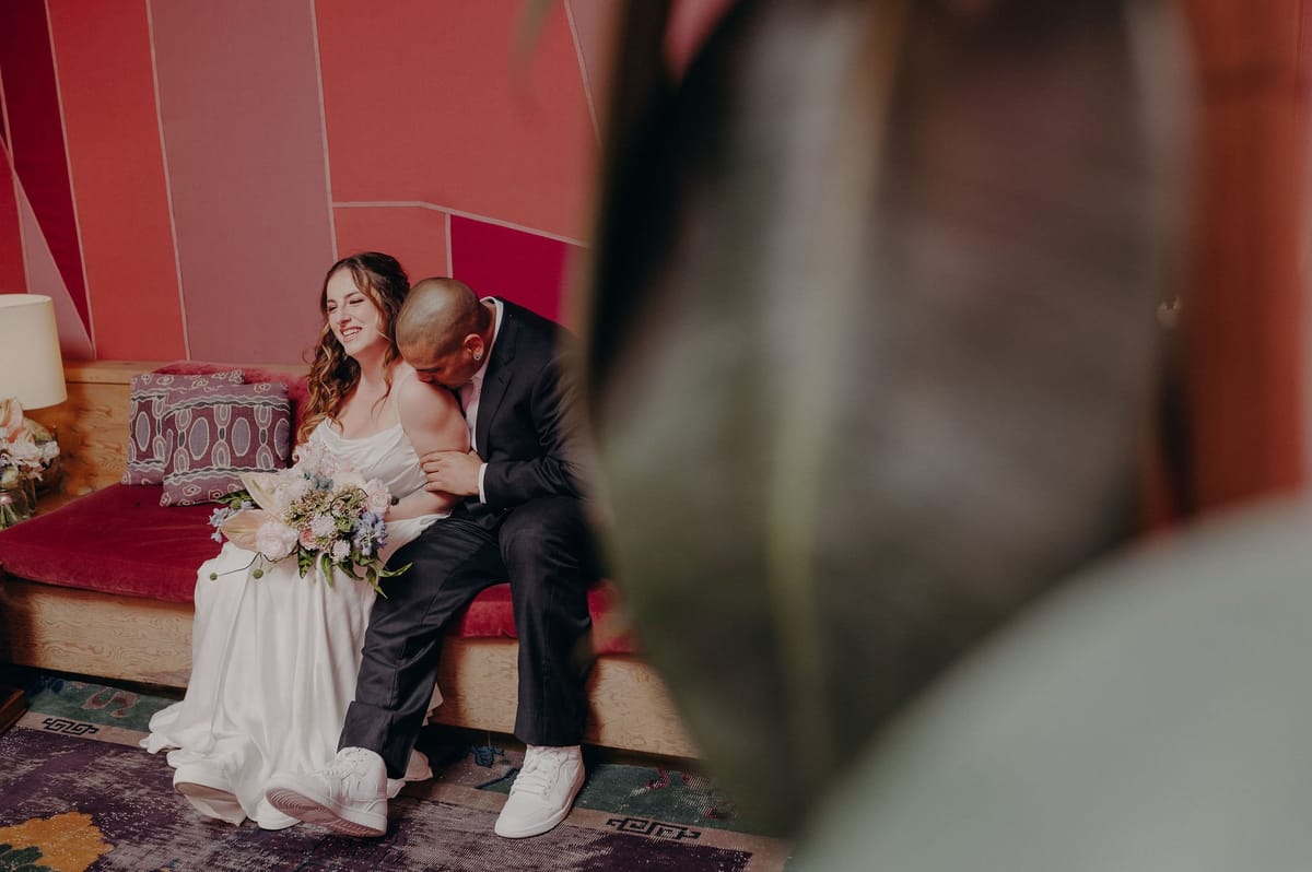 bride and groom get ready for their wedding together in downtown LA