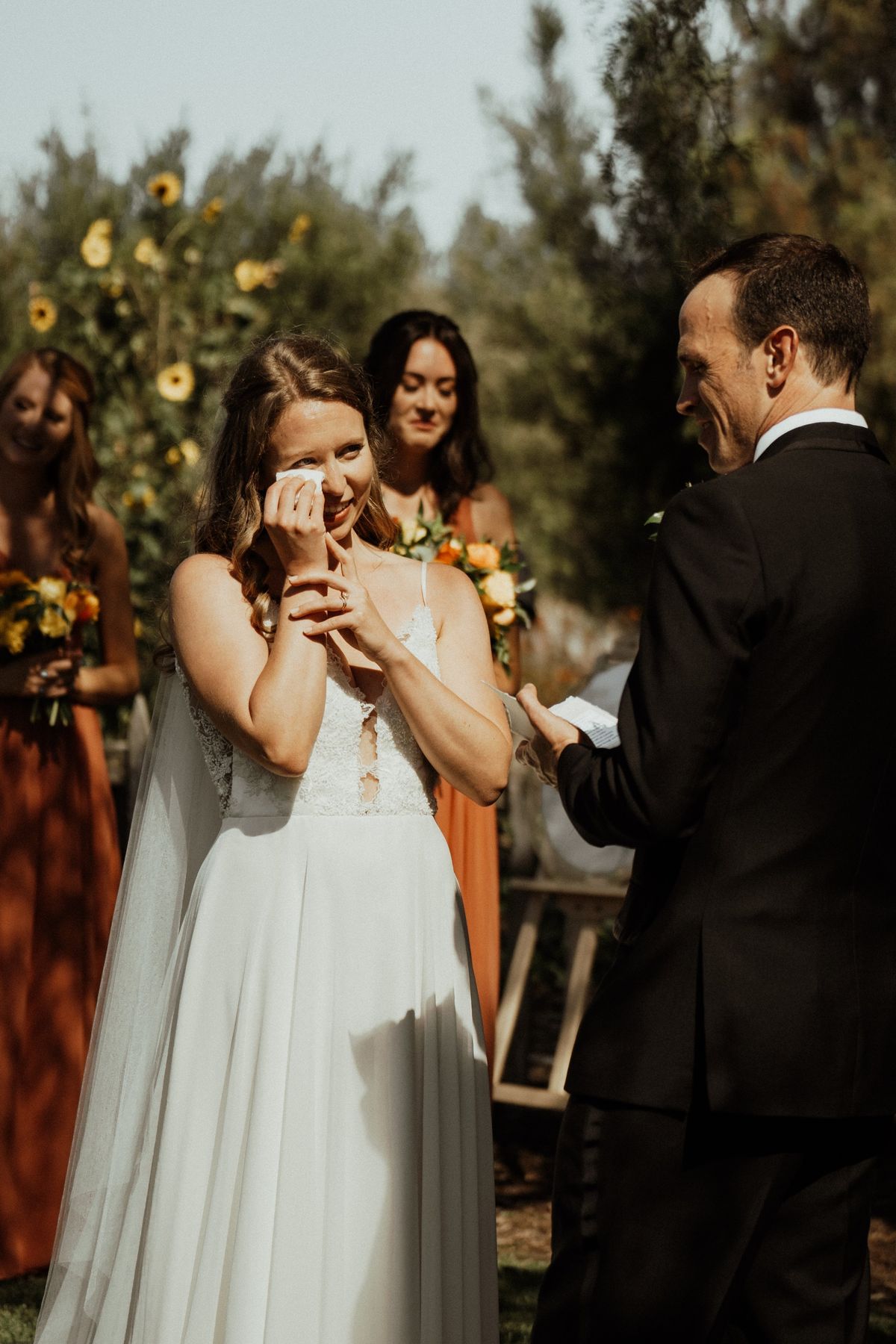 bride tears up during wedding ceremony at southern california venue catalina view gardens
