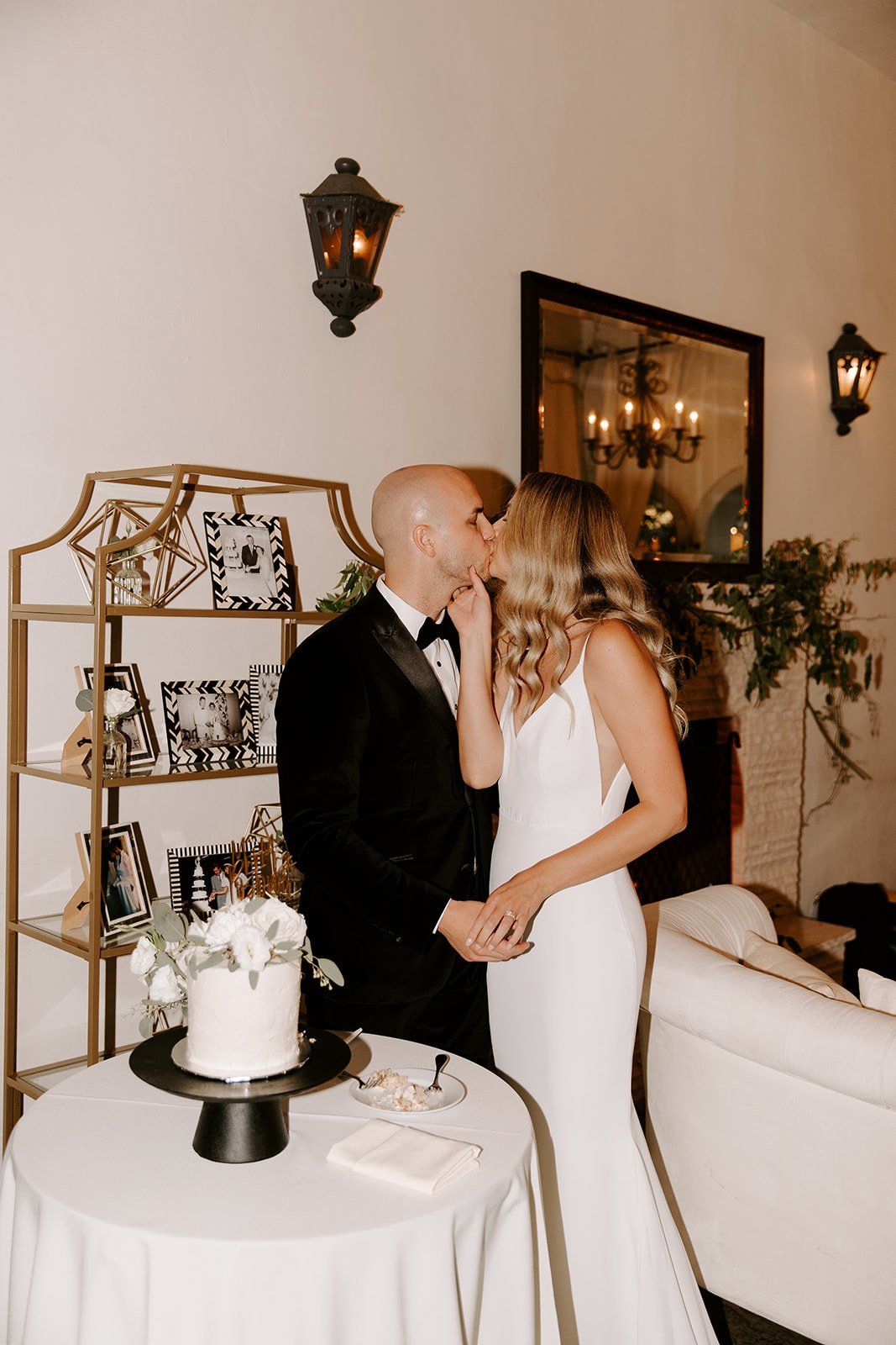 bride and groom cut the cake at their santa barbara wedding at villa and vine