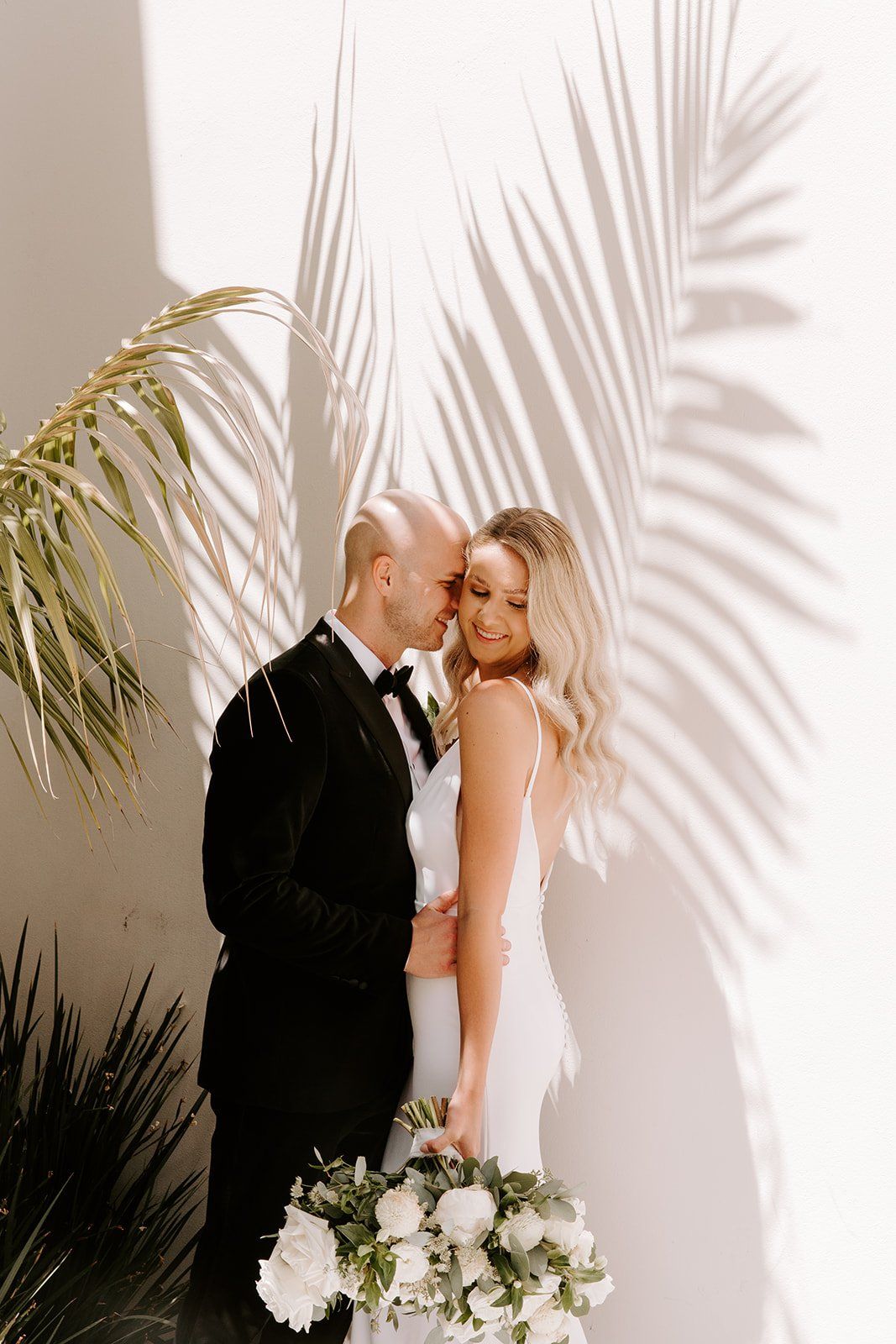 old hollywood wave hairstyle and natural airbrush makeup for this bride
