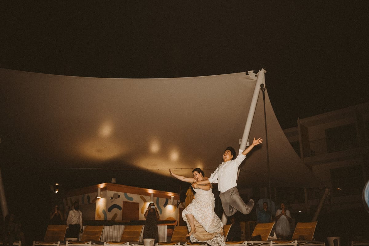palm springs wedding ends with the bride jumping in the pool
