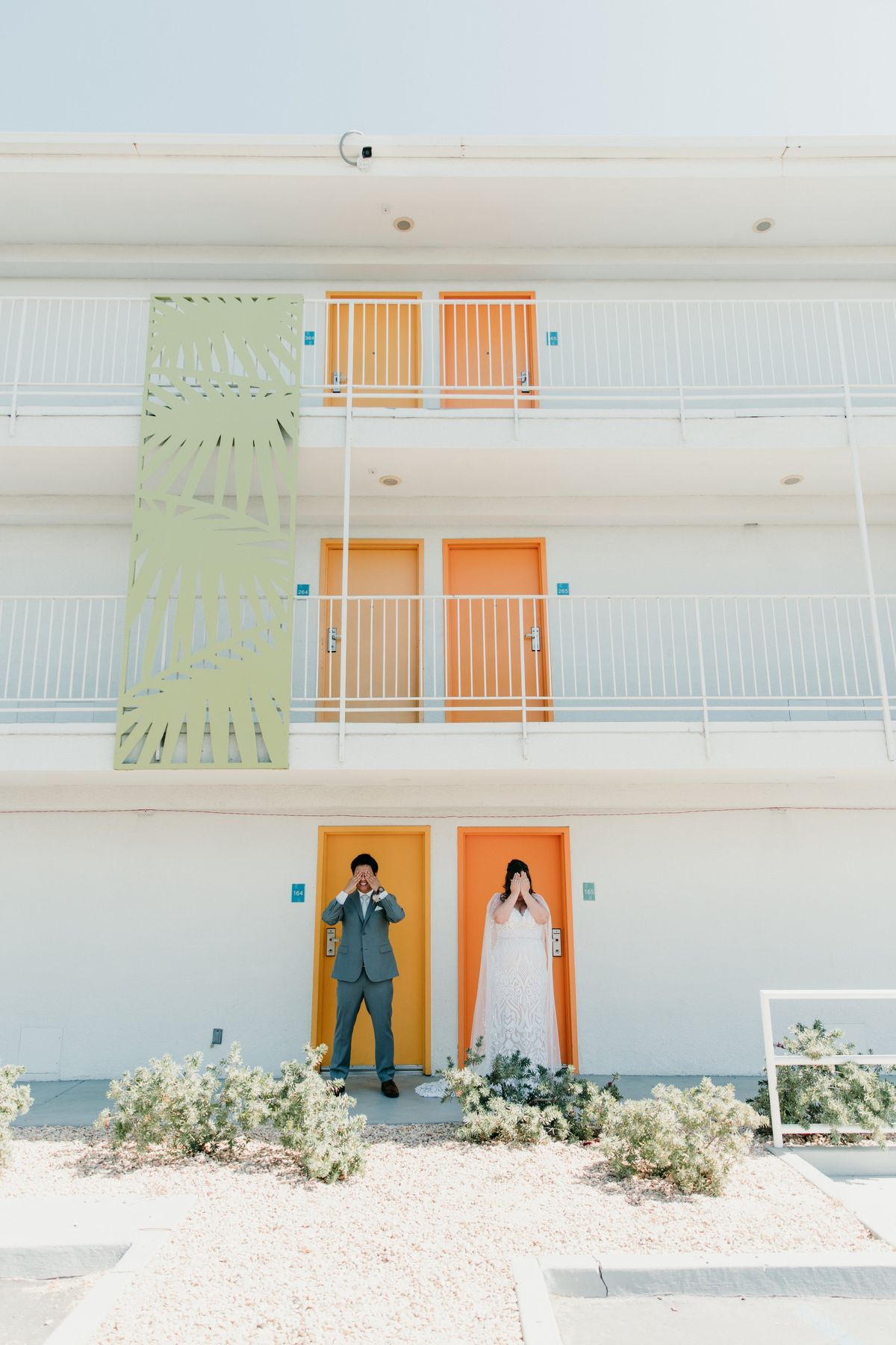 the saguaro was the perfect colorful backdrop for this couple's first look moment