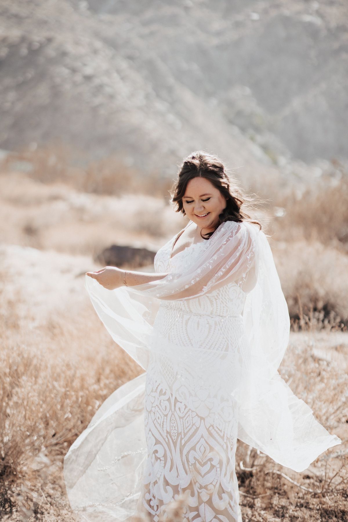 boho and braided hairstyle for this palm springs bride