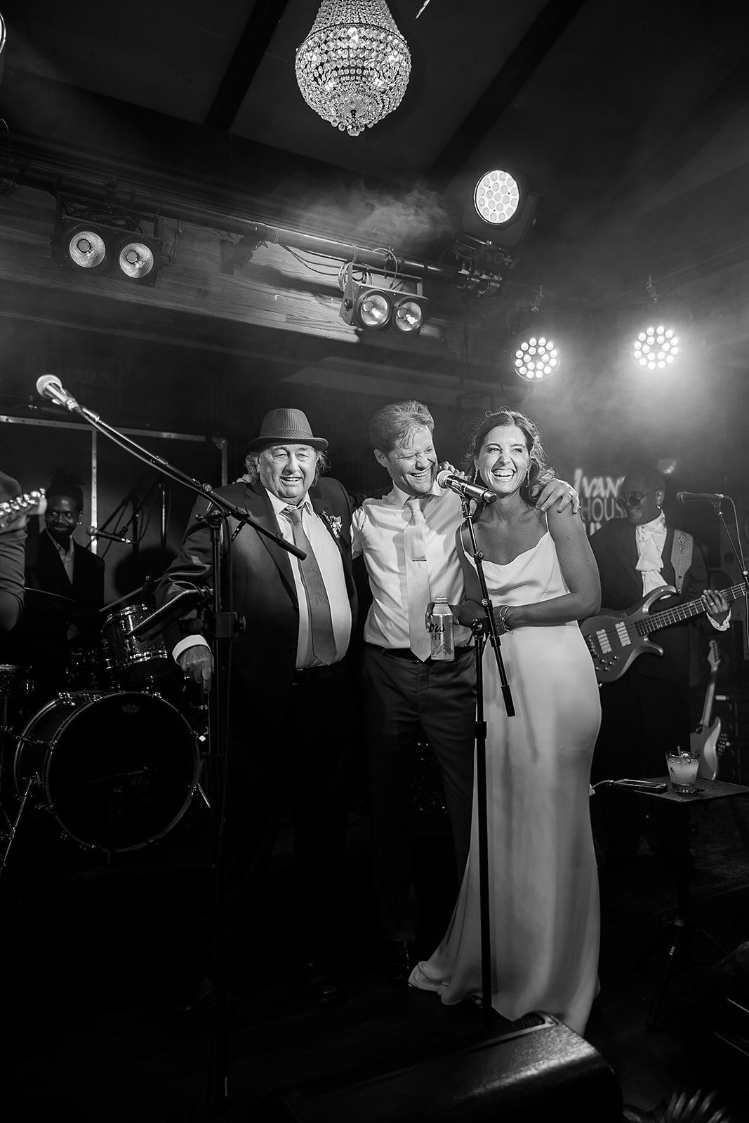 bride and groom enjoy wedding reception together in laguna beach