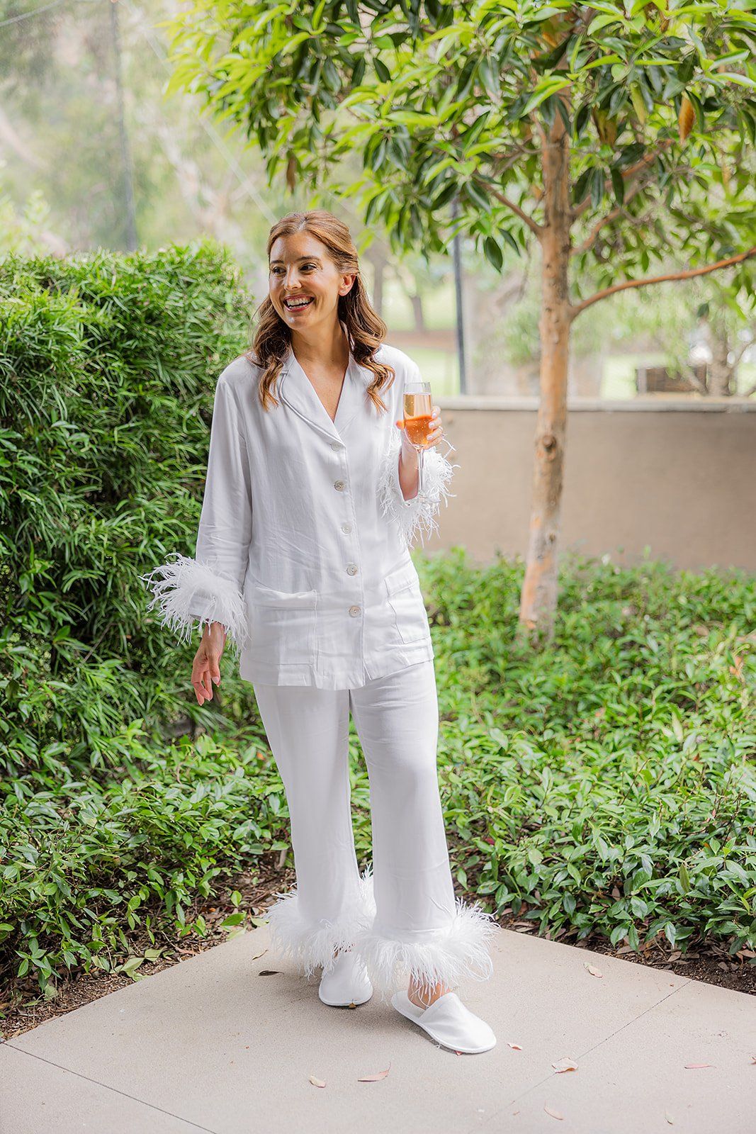 bride getting ready for her wedding at the ranch at laguna beach