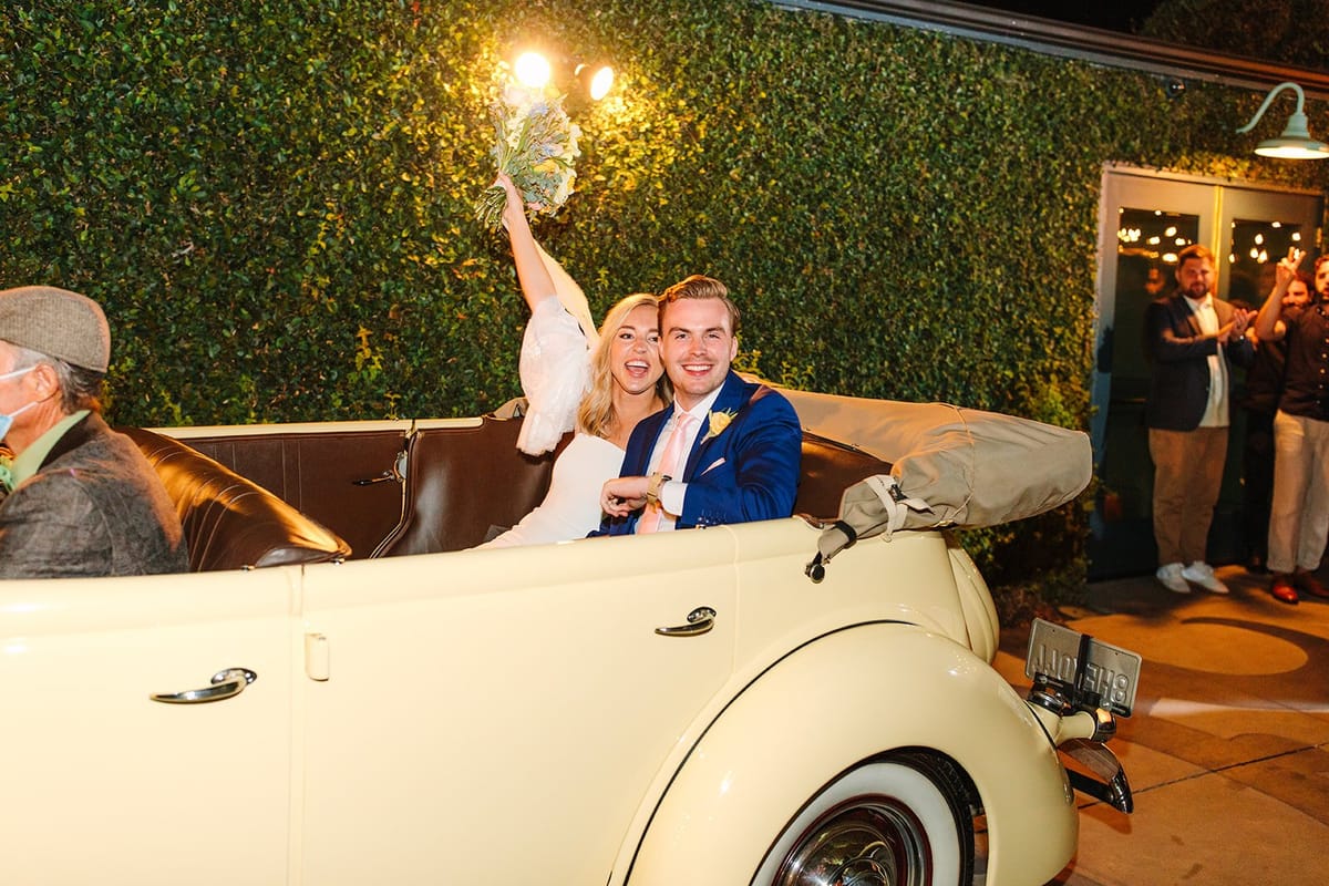 bride and groom's reception exit is colorful and adorable