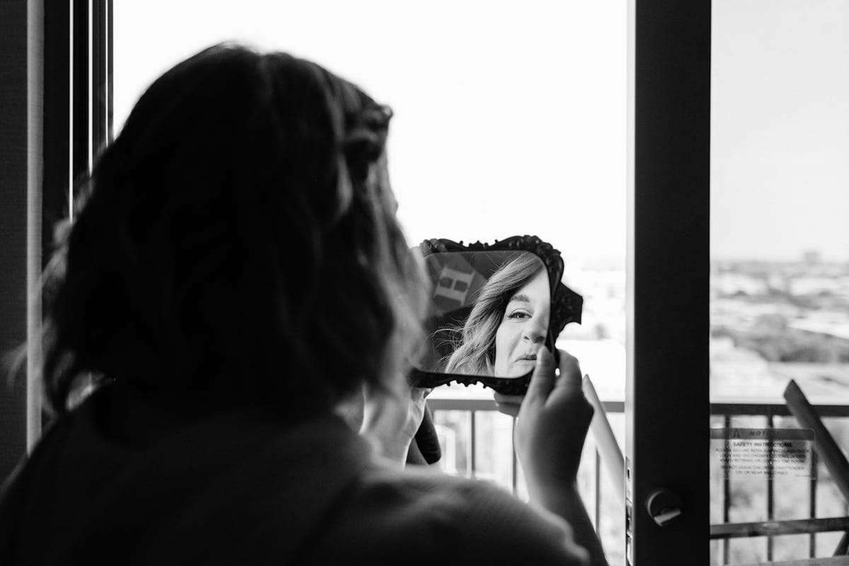 bride getting her hair and makeup done for her wedding in pasadena