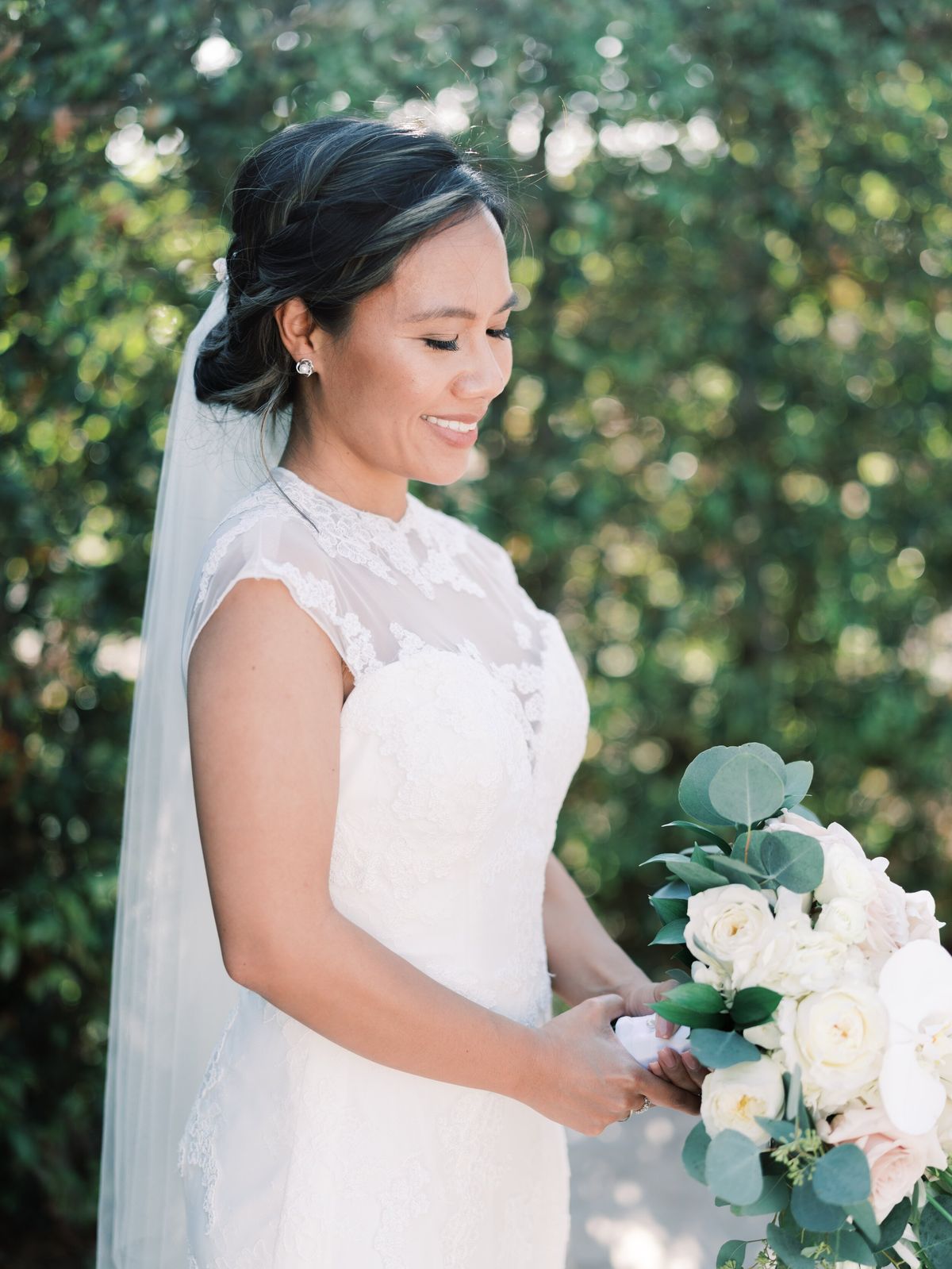 a boho, braided, and loose updo for this LA bride's wedding day