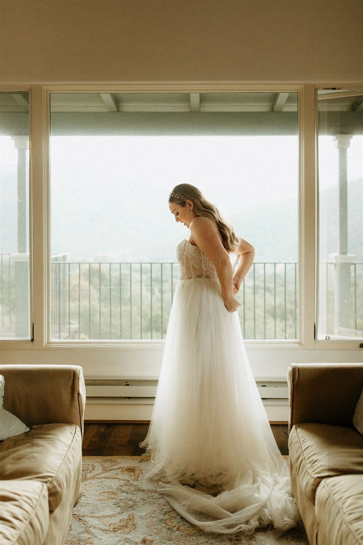 bride gets ready for private and intimate elopement in carmel valley airbnb