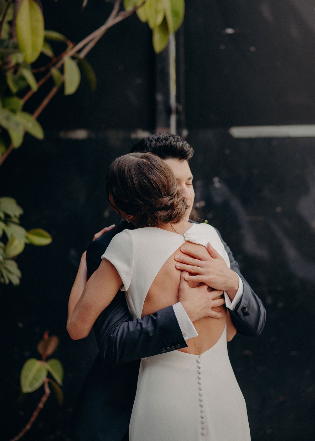 couple hug after intimate first look moment