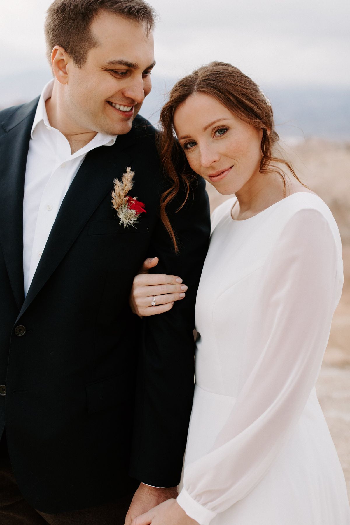 bride's natural makeup look and loose, boho hairstyle perfect for her death valley national park elopement