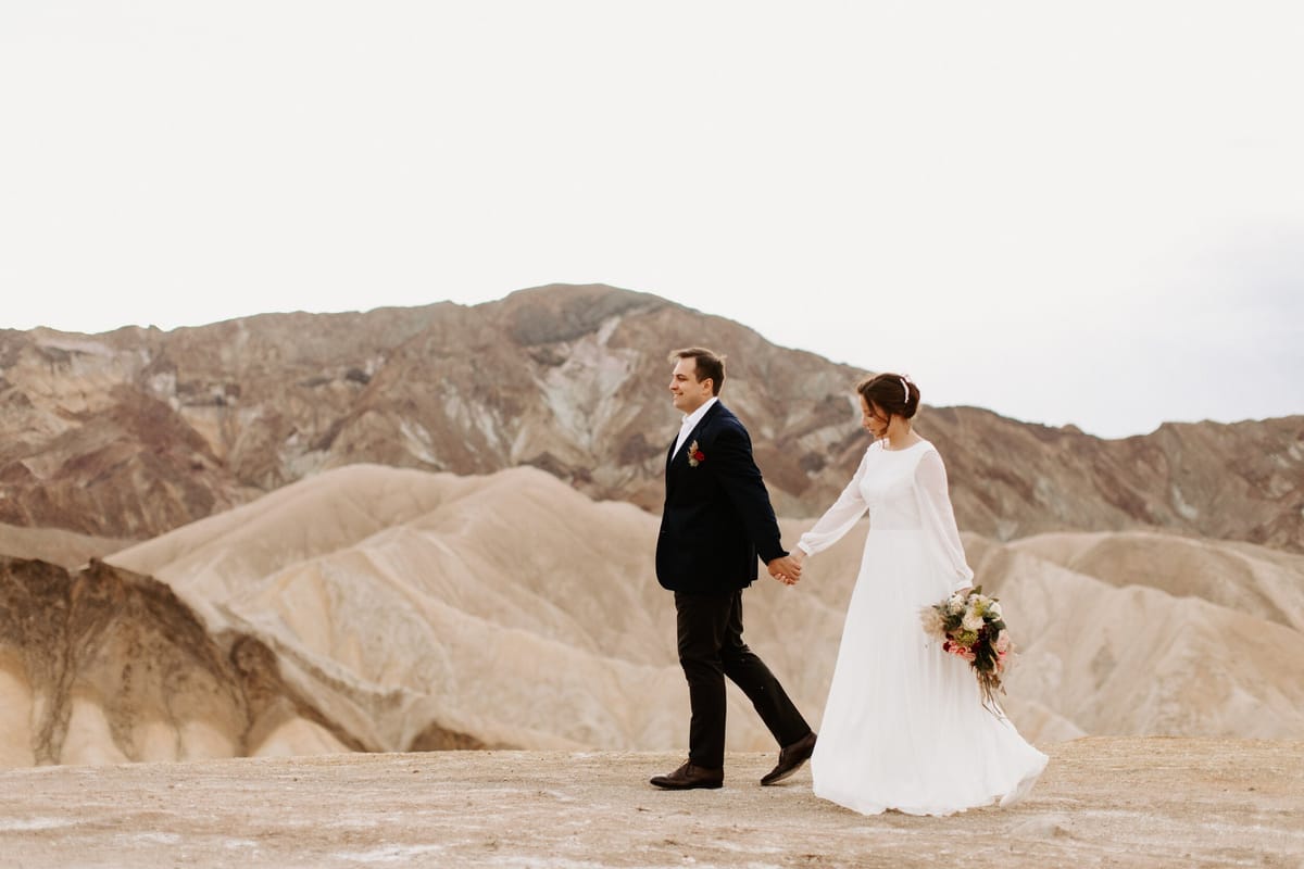 bride and groom plan destination wedding in death valley national park