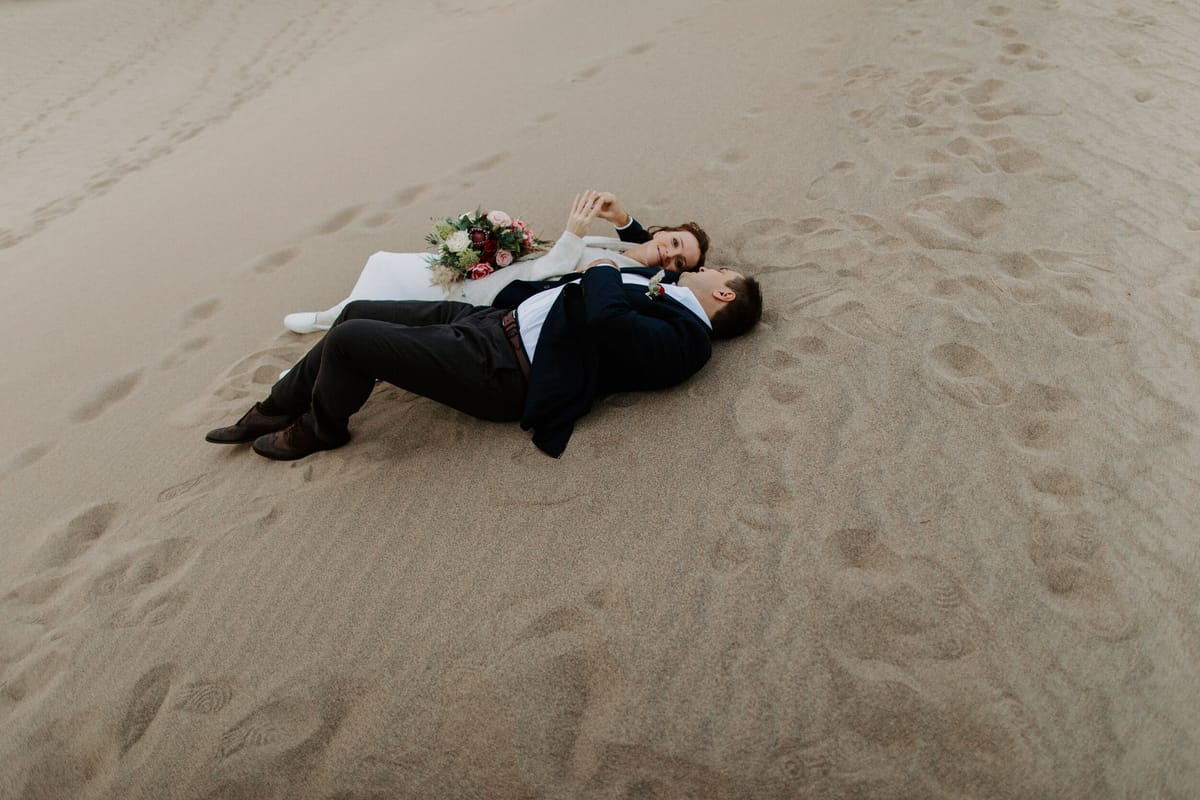 sand dunes make for a gorgeous setting after couple's destination elopement