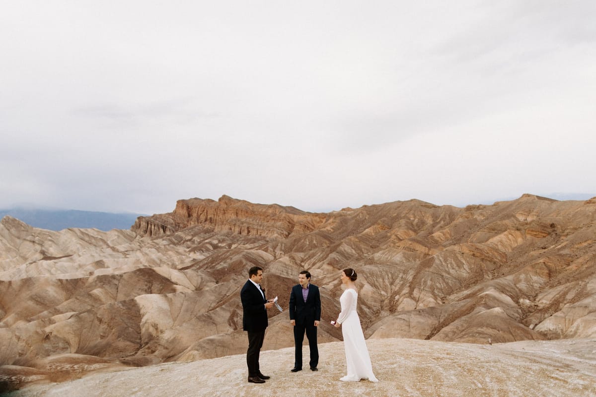 couple's epic destination elopement at zabriskie point in death valley national park