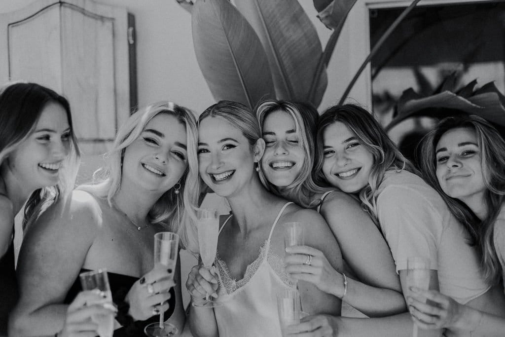 bride and bridesmaids cheers