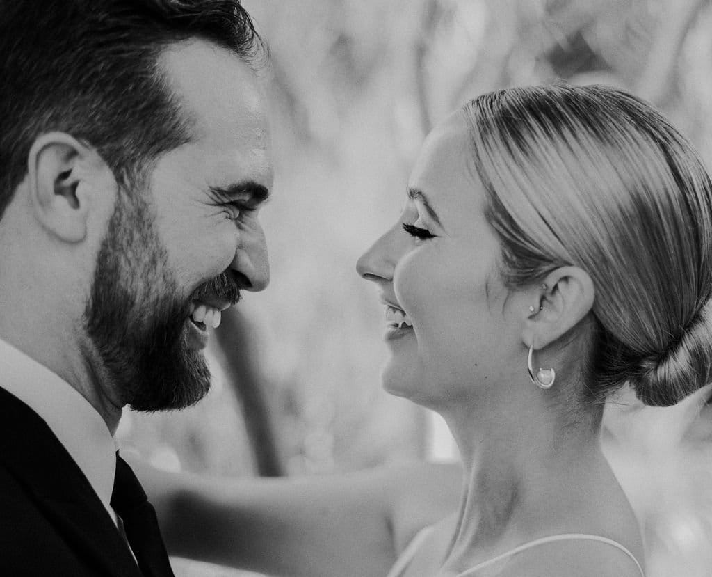 bride and groom share intimate moments during wedding photos
