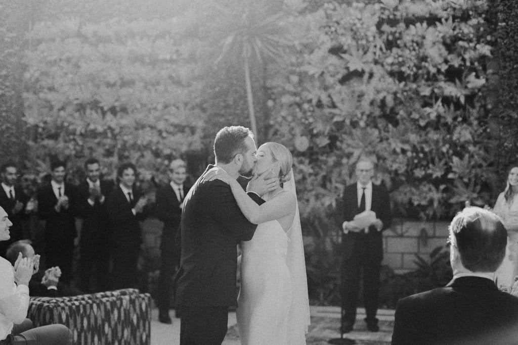 newlyweds walk down the isle after wedding ceremony