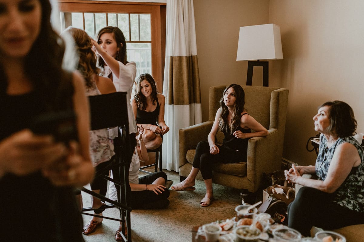 bridal party getting hair and makeup ready for wedding in solvang, california