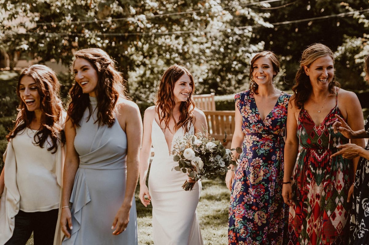 bridal party with bride during photos
