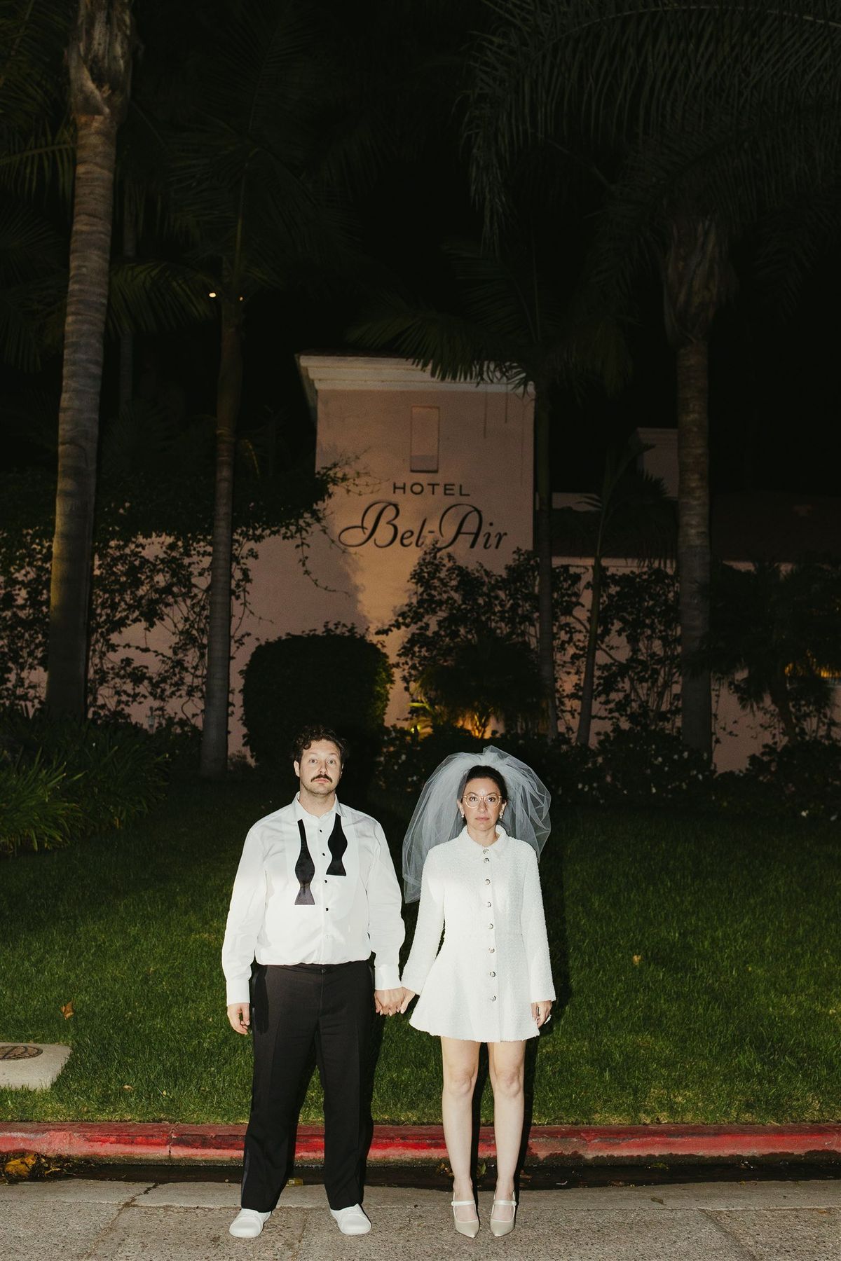 bride and groom at hotel bel air after wedding