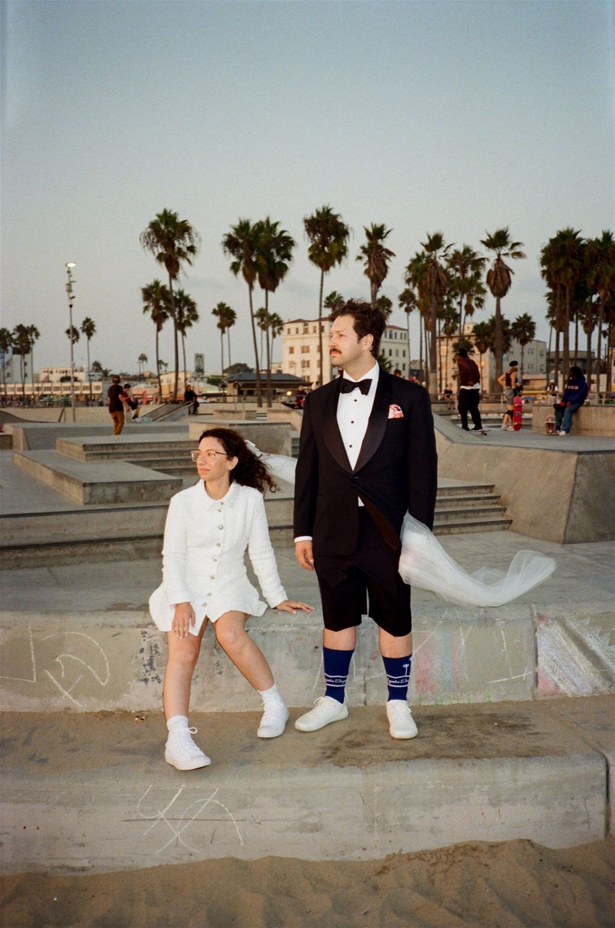bride and groom elopement photos at the venice skatepark in los angeles ca