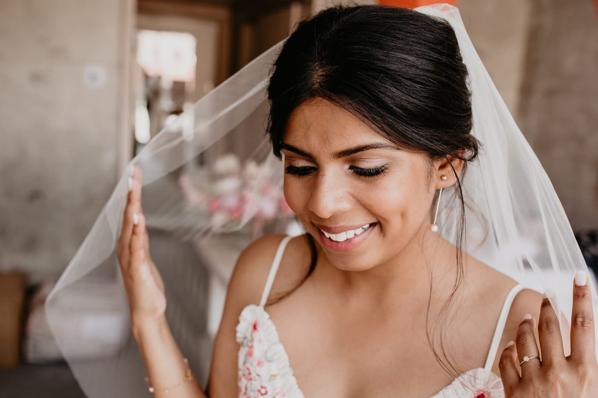 bride wanted natural, soft makeup and a romantic, loose updo for her rooftop wedding at the line hotel