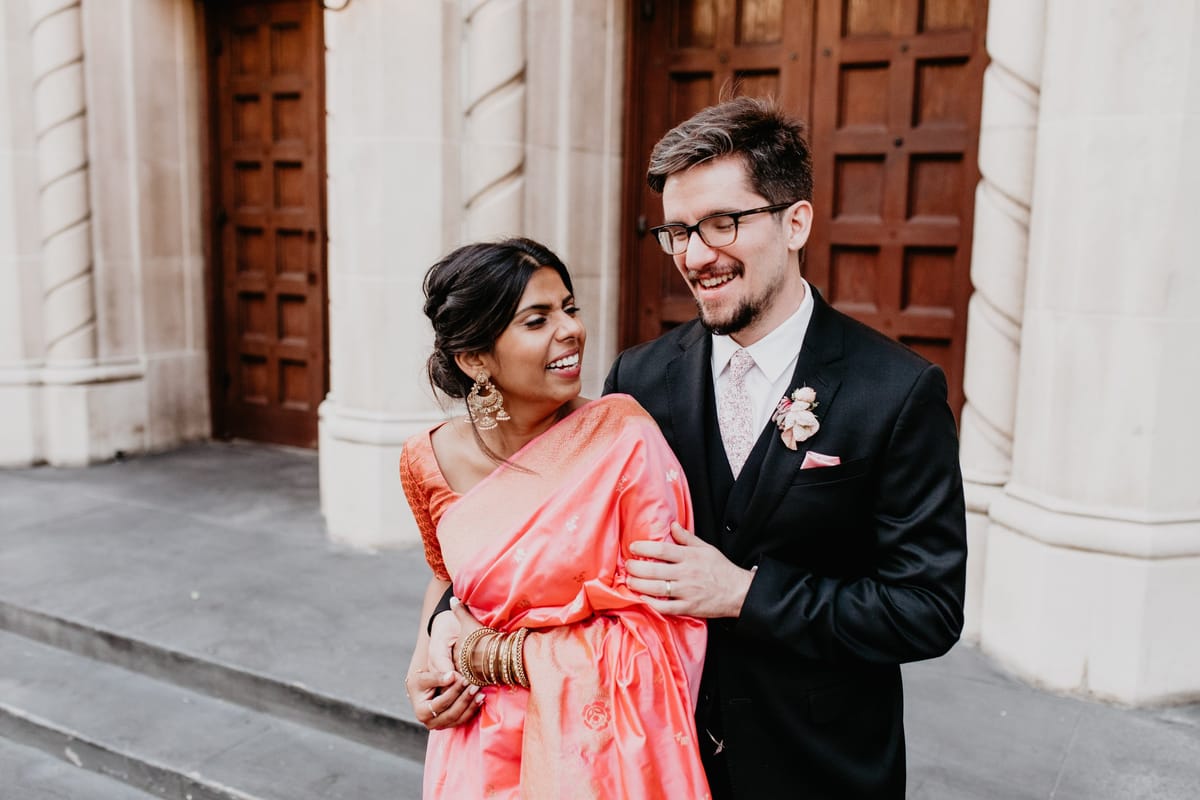 couple takes wedding day portraits after los angeles rooftop wedding at the line hotel