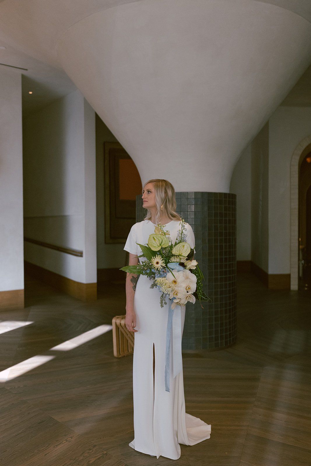 bride is hair and makeup ready for her destination elopement in beverly hills