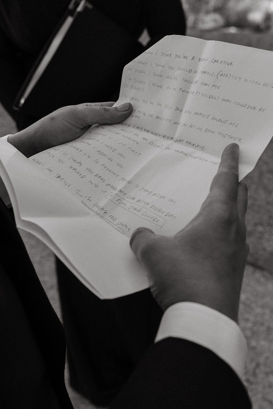 groom reads his vows during his los angeles wedding ceremony