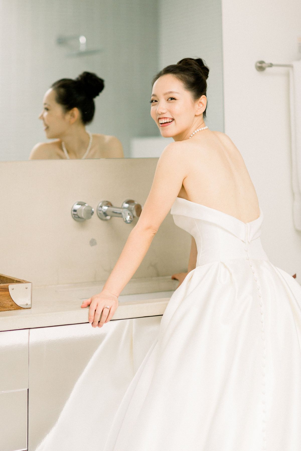 kim sing theatre bride as she gets ready for her small, intimate wedding ceremony