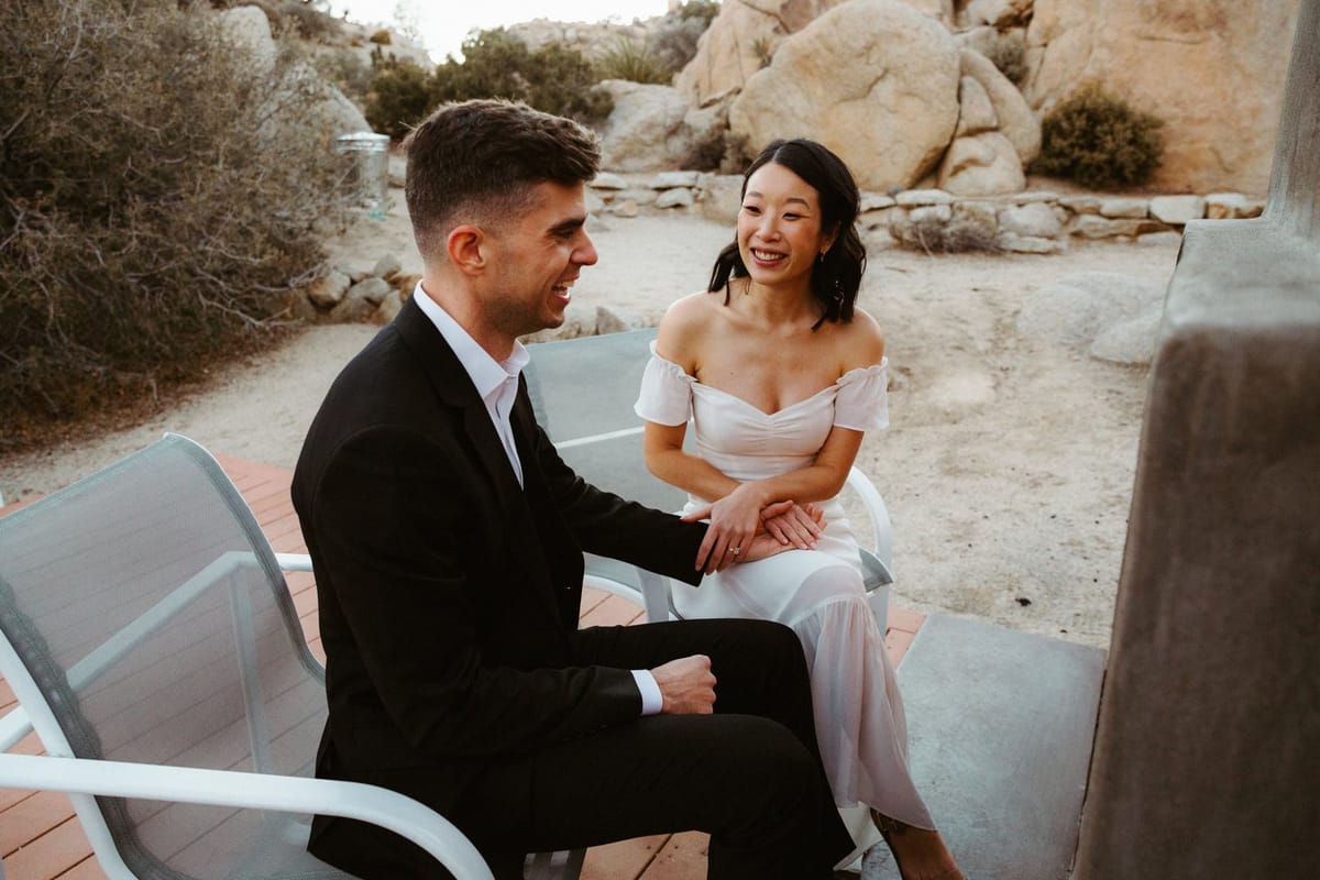after the wedding ceremony, our couple goes back to their airbnb to sit by the fire and enjoy their view
