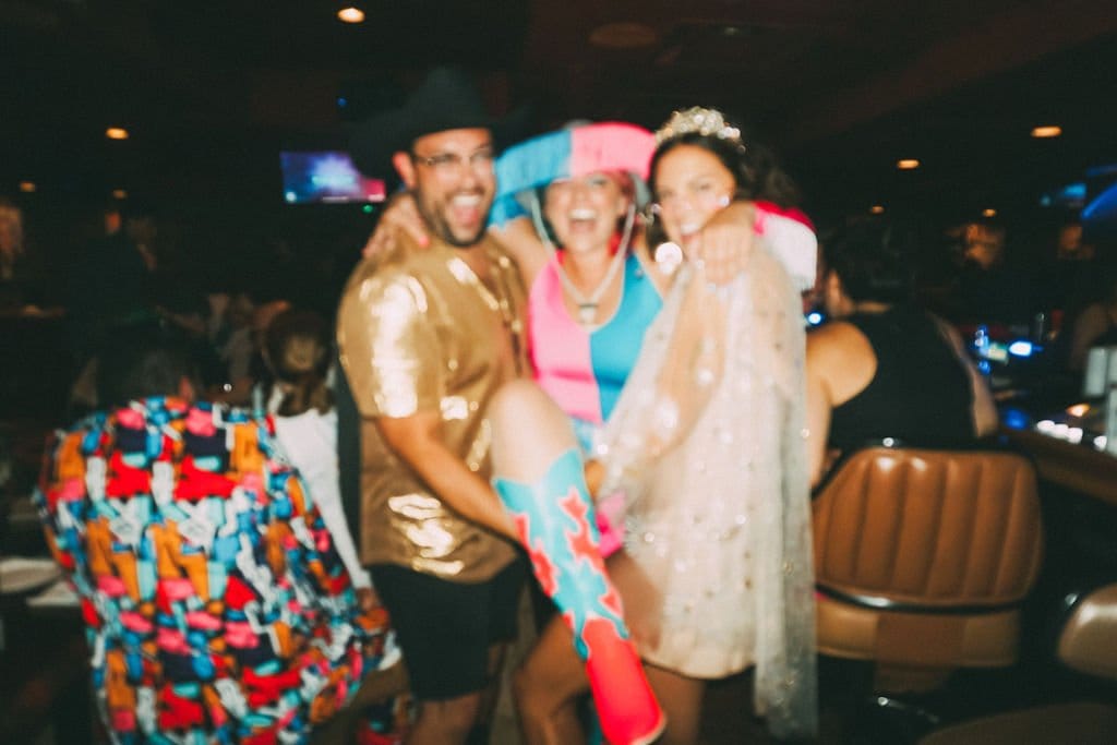 bride and groom plan wedding reception at a vegas karaoke bar