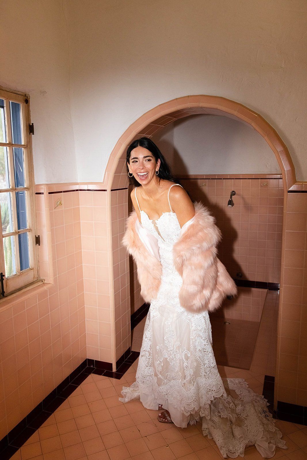iconic pink bathroom moment for the bride
