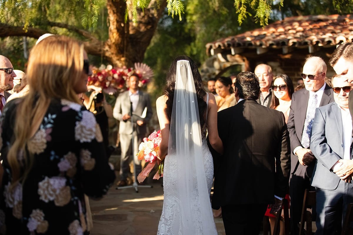bride walks down the isle