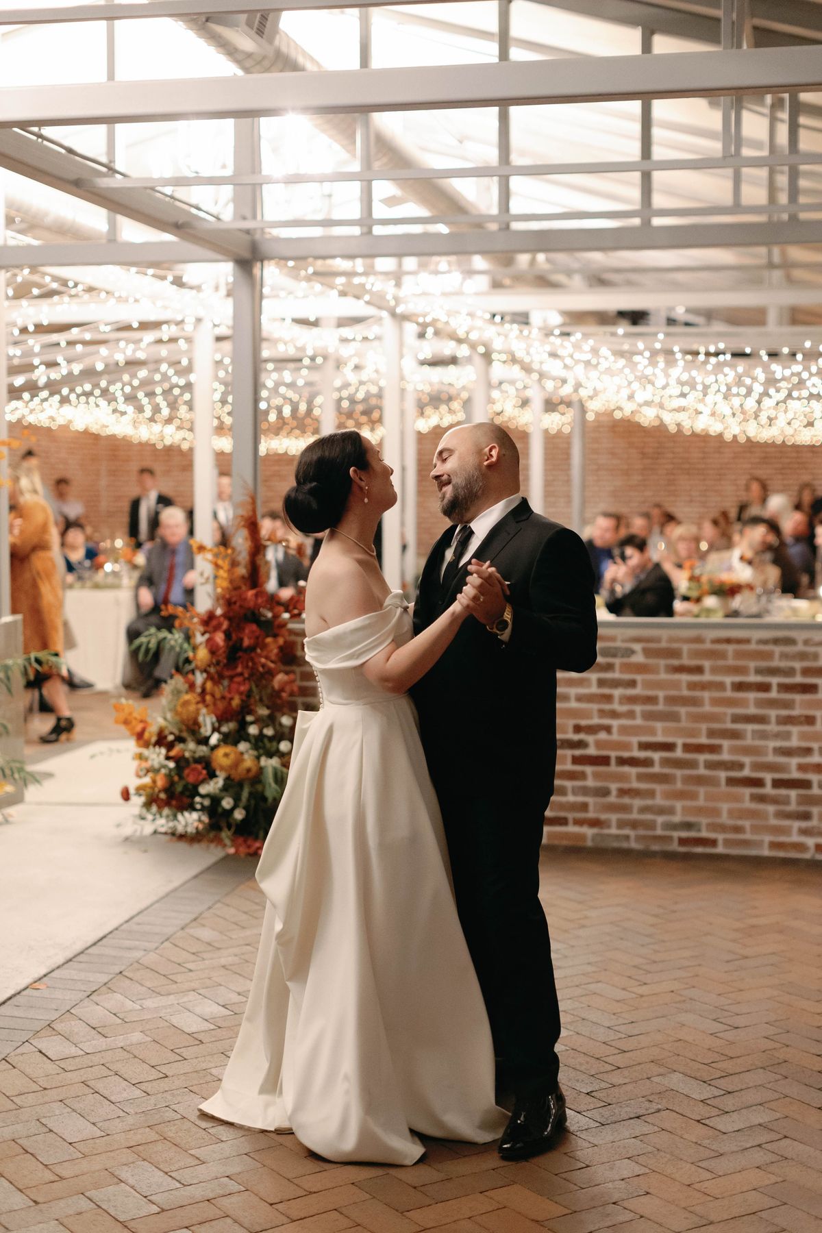 bride and groom during the first dance at their wedding reception in LA