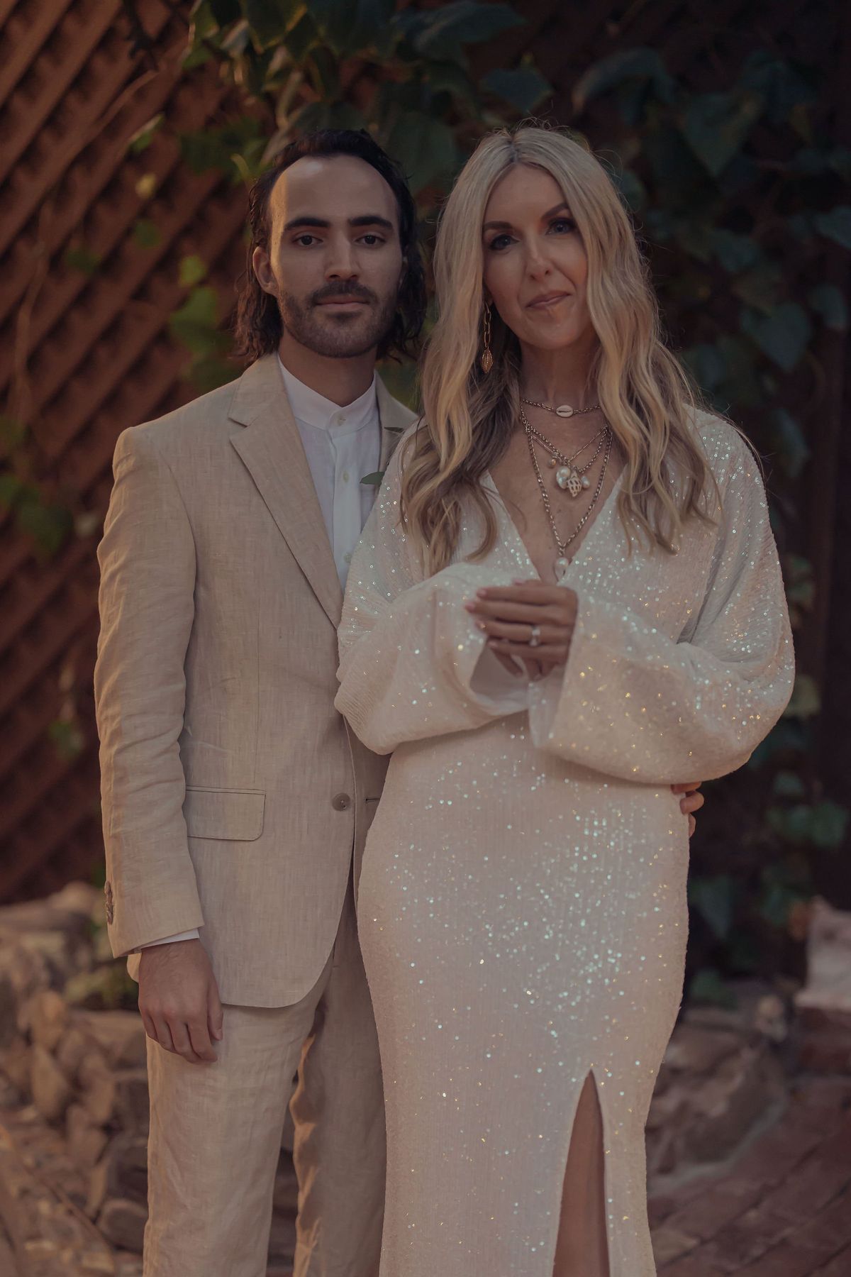 bride and groom share intimate wedding reception with guests at the inn of the seventh ray in topanga canyon, CA