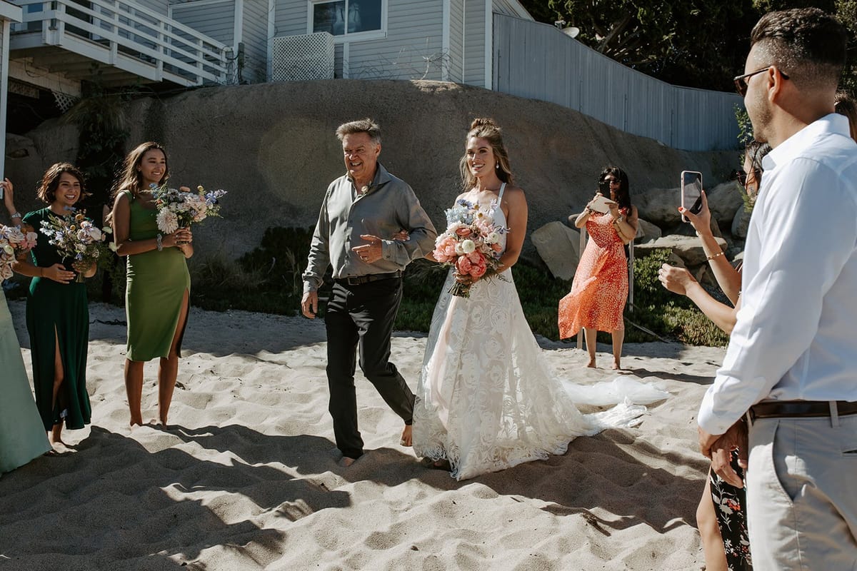 intimate micro wedding on the beach in malibu, california