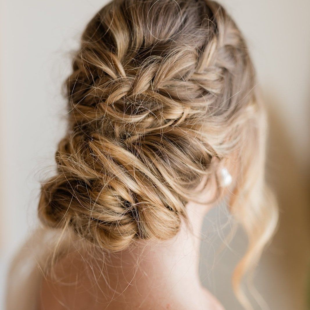 loose, romantic, braided updo wedding hairstyle