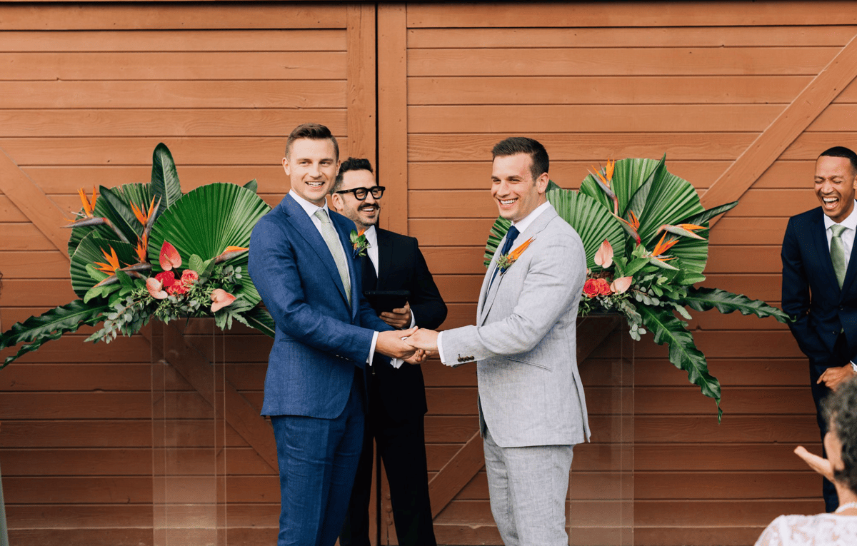 grooms marry in dana point california at the ocean institute