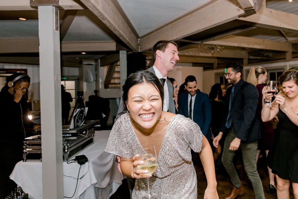 bride and groom let loose at their malibu wedding reception