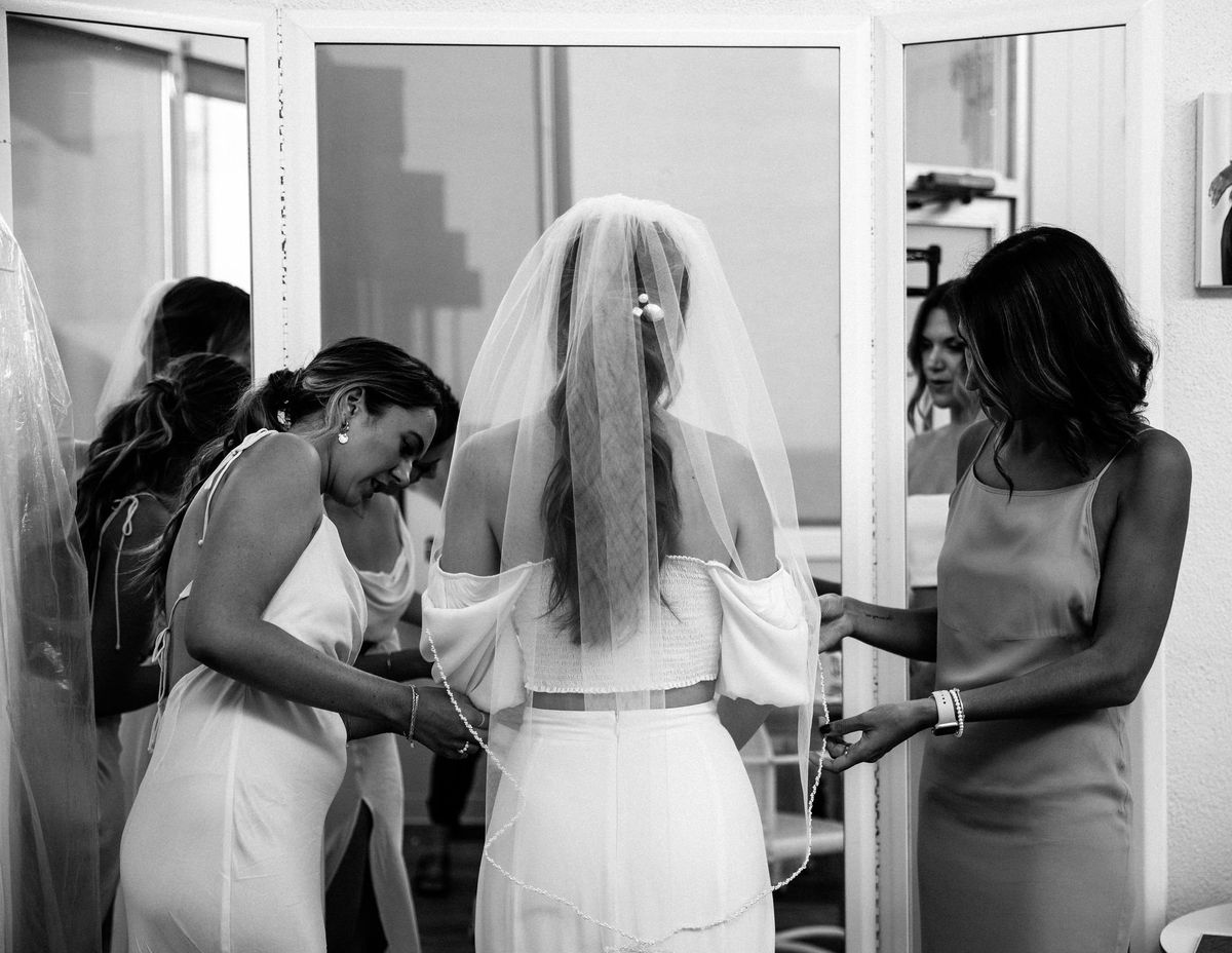 bride getting ready to walk down the aisle in malibu
