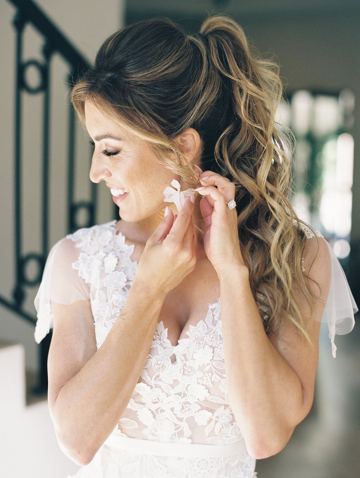 one of my favorite bridal hair trends is a simple and tousled ponytail, perfect for this bride's california wedding day