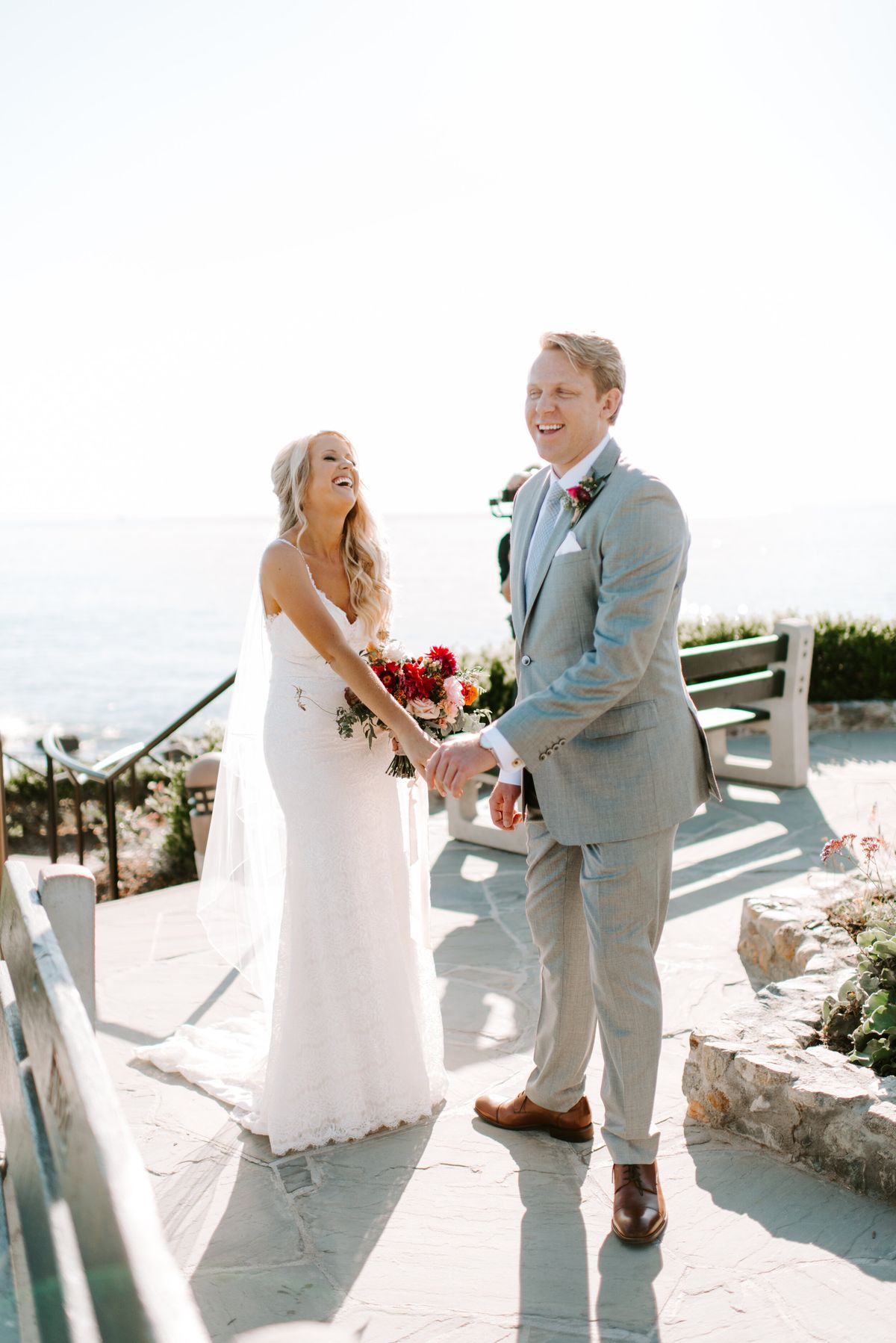 bride and groom's first look at crescent bay in laguna beach, california
